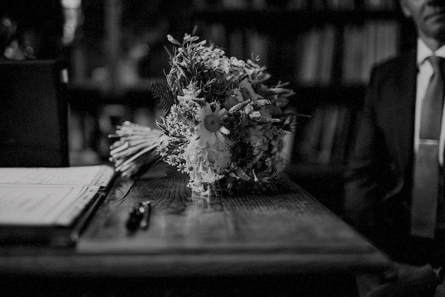 The brides wedding bouquet on the wooden table