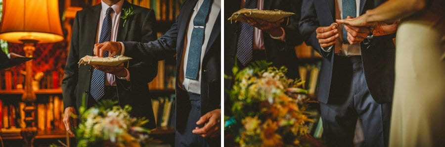 The bride and groom exchange wedding rings during the ceremony