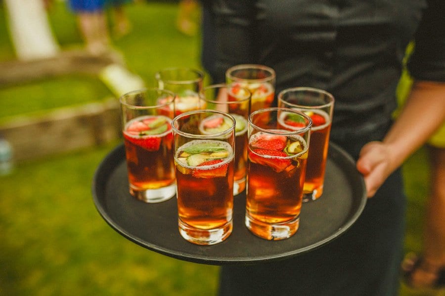 Drinks are served on a tray in the gardens
