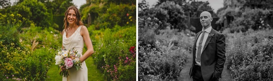 The bride and groom pose for photographs in the gardens at Abbey House