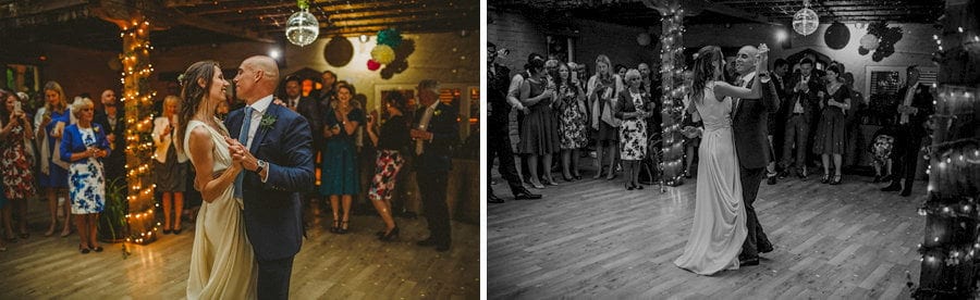 The bride and groom dance together on the dancefloor
