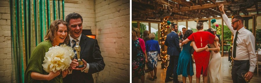 Wedding guests pose for photographs and dancing on the dancefloor