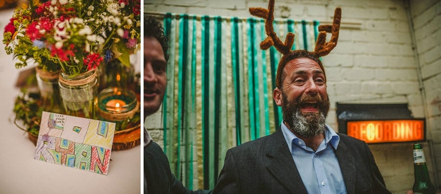 A man poses for a photograph in the photo booth