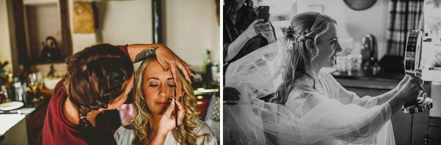 The makeup artist applies makeup to the brides face in the kitchen