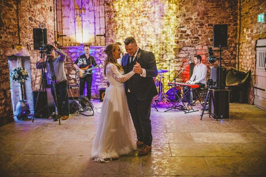 The bride and groom's first dance in the barn
