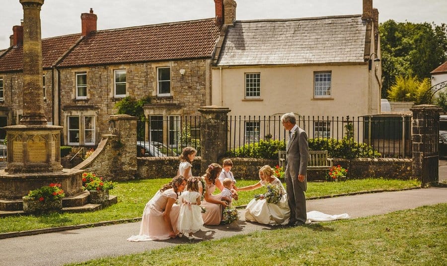 The bride and her father arrive at the church in Wedmore