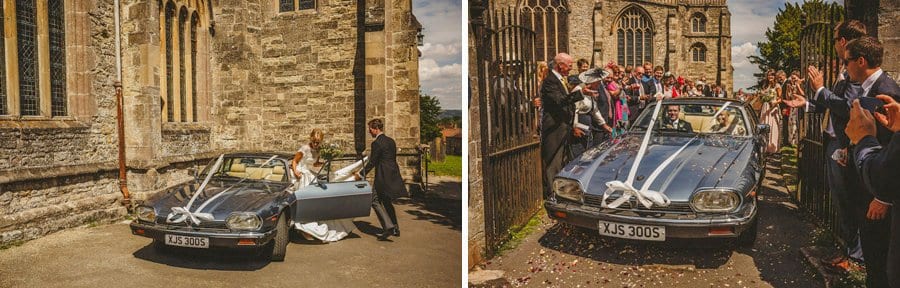 The bride and groom leave the church in Wedmore in an old car