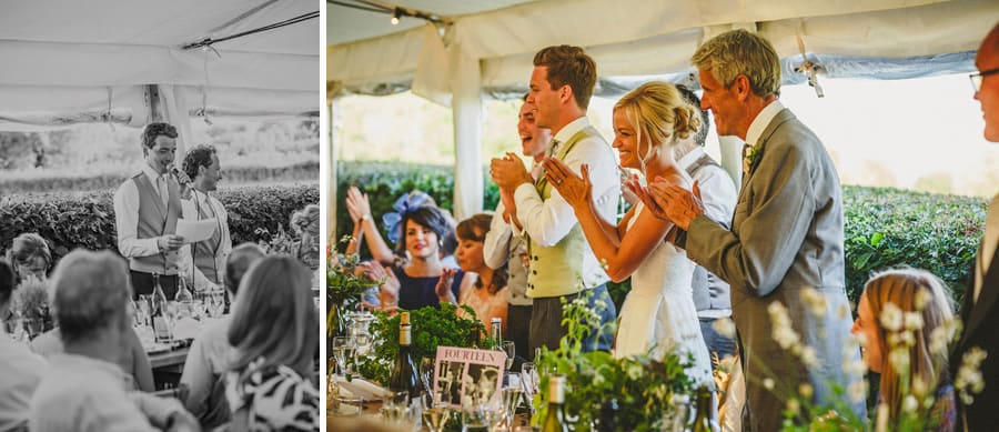 The bride and groom stand up and applaud the best mans speech