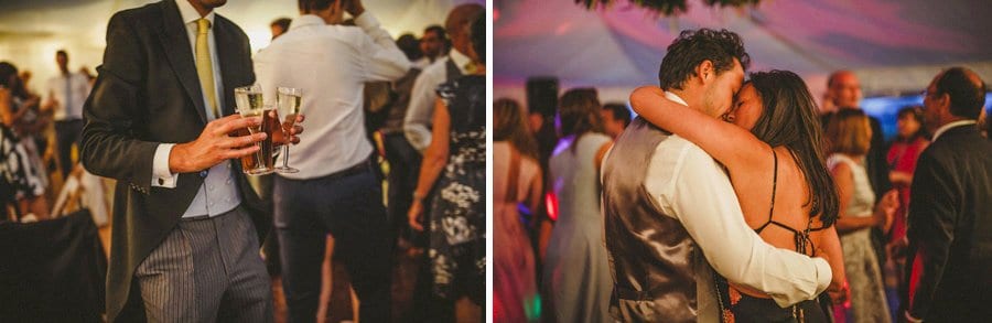 Glasses of champagne being carried across the dancefloor