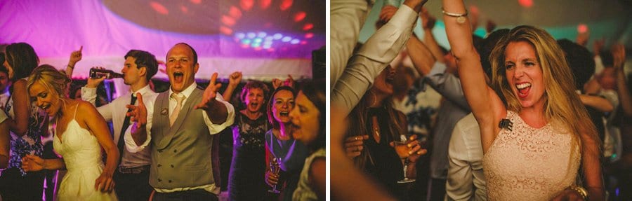 An usher and the bride dancing in the marquee