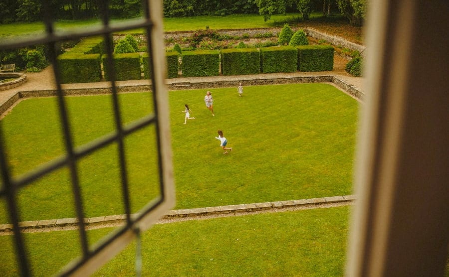 Children play on the front lawn at Voewood