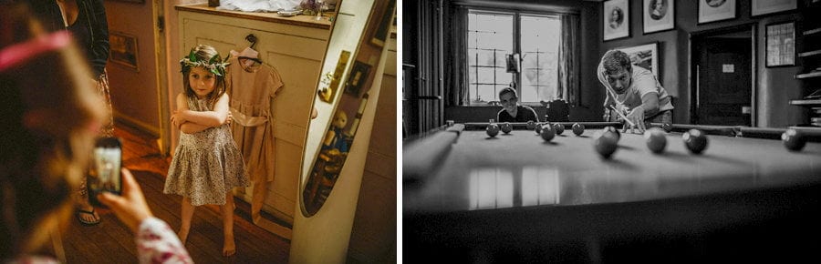 Wedding guests playing pool in the billiards room in Voewood House in Norfolk
