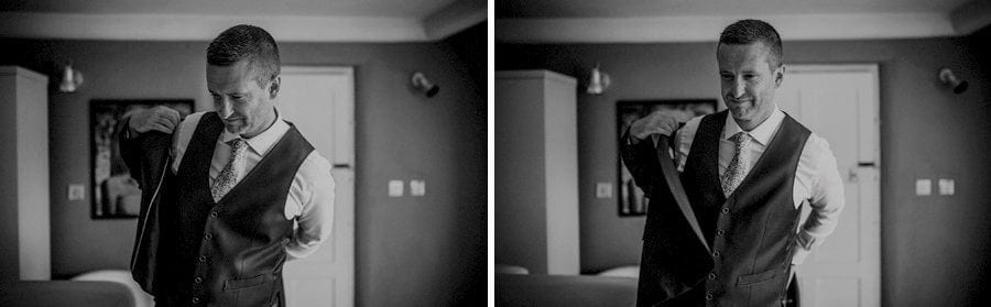 The groom puts on his suit jacket