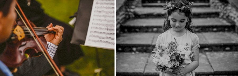 A flower girl looks down at her bouquet