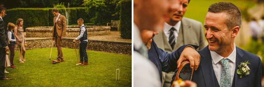 Wedding guests play croquet on the lawn at the front of Voewood house