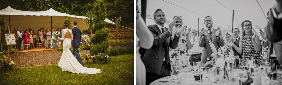 The bride and groom enter the marquee at Voewood