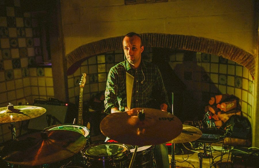 The drummer of the wedding band performs a song