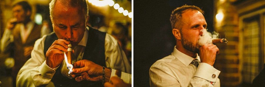 Wedding guests smoke cigars