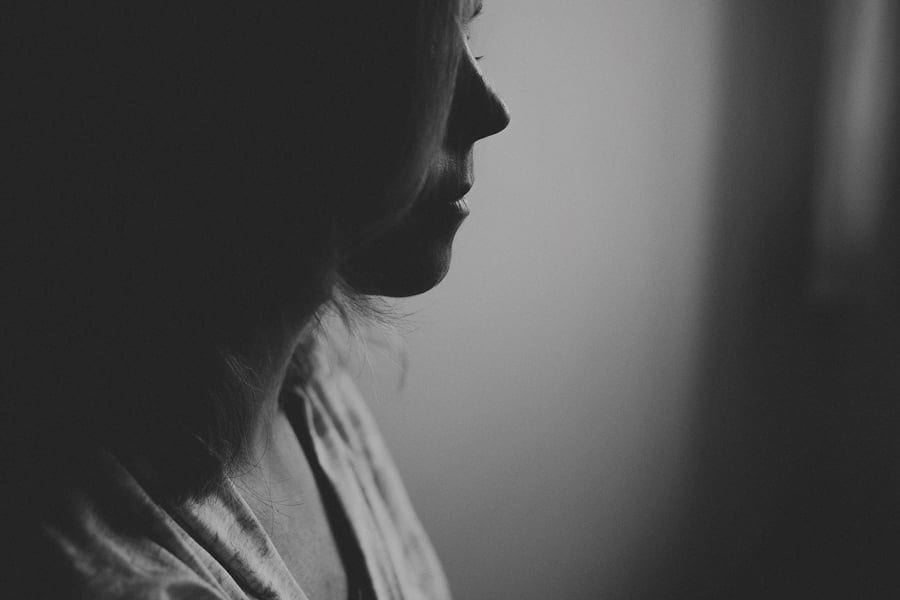 The make up artist applies make up onto the brides face