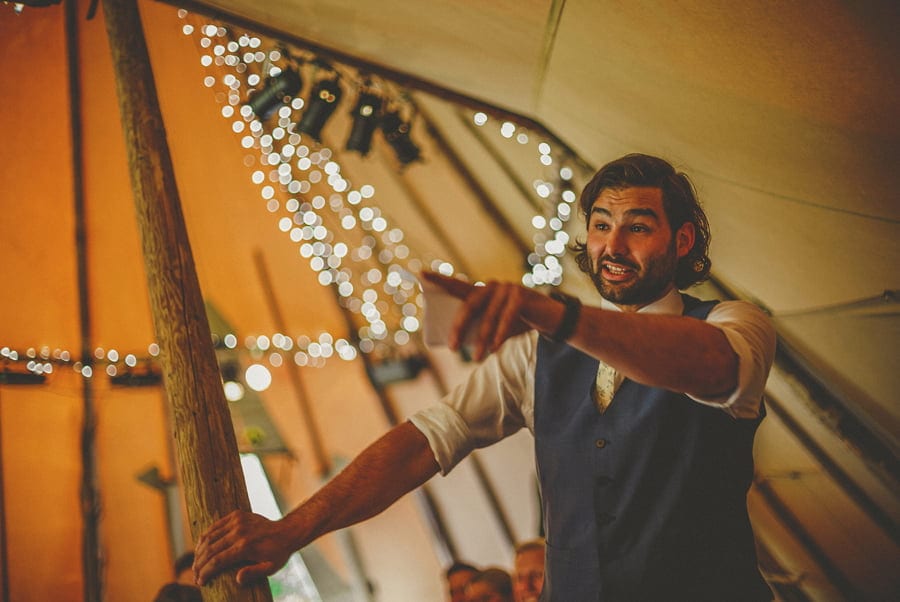 The best man delivers his speech in the tipi