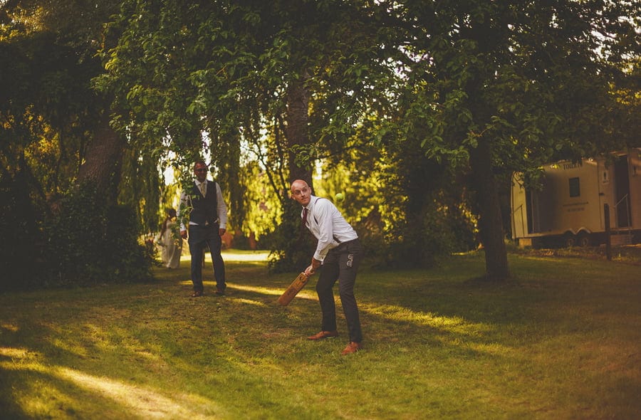 The ushers playing cricket in the back garden