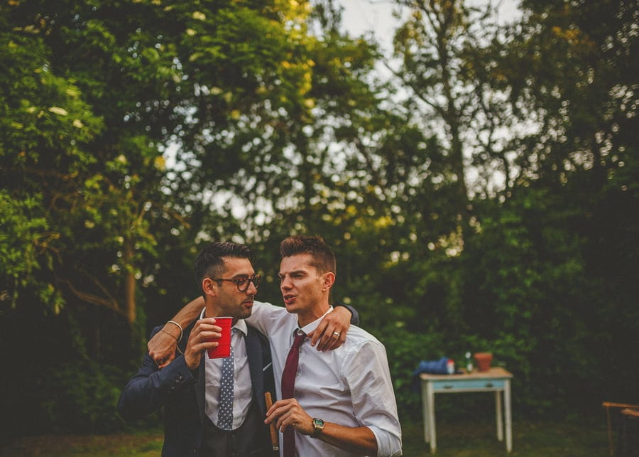 Wedding guests drinking alcohol together