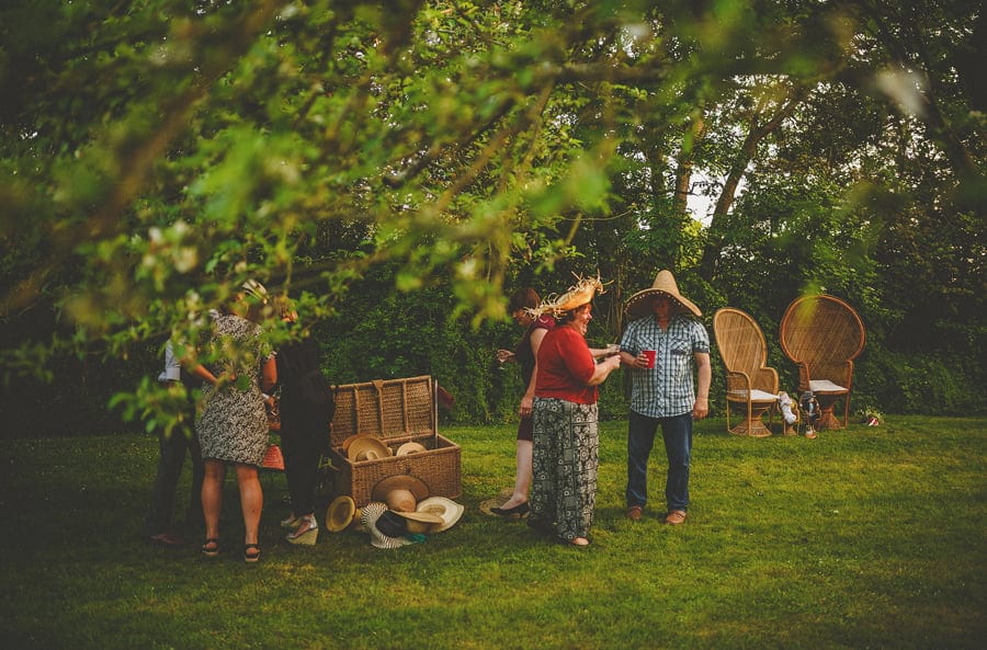 The wedding guests dressing up in the back garden