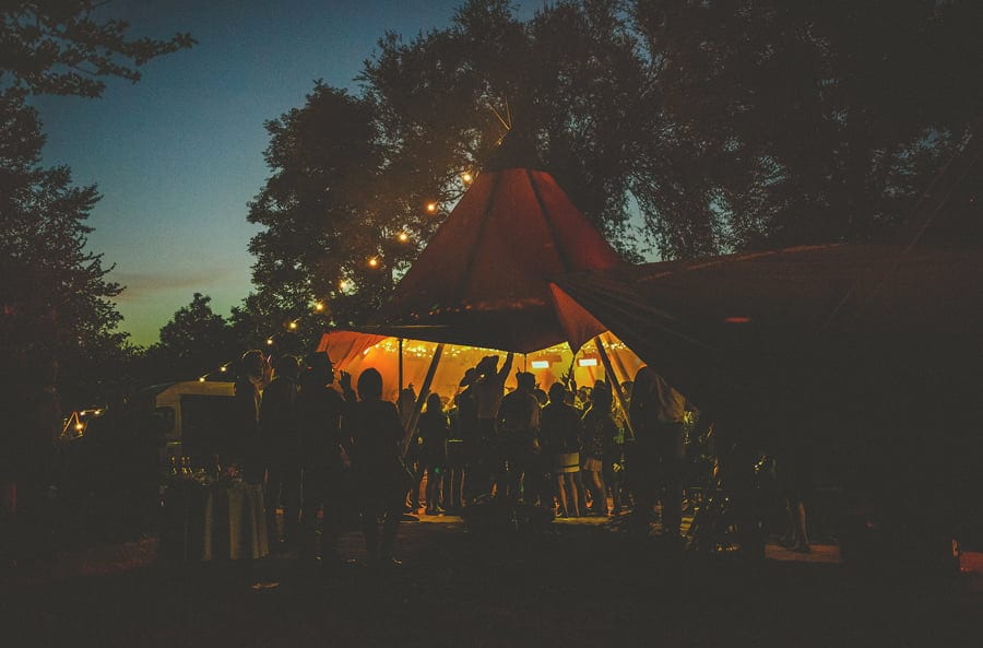 Guests singing and dancing in the marquee