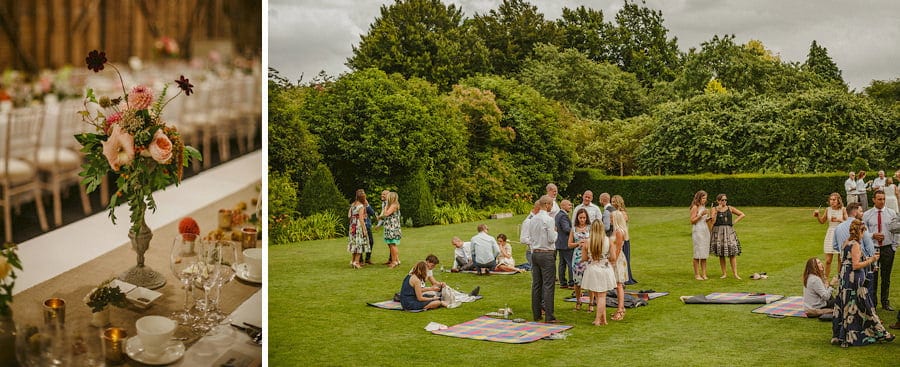 Wedding guests chat amongst themselves on the lawn at Childerley