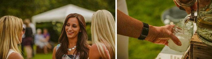 Wedding guests chat amongst themselves on the lawn at Childerley Estate