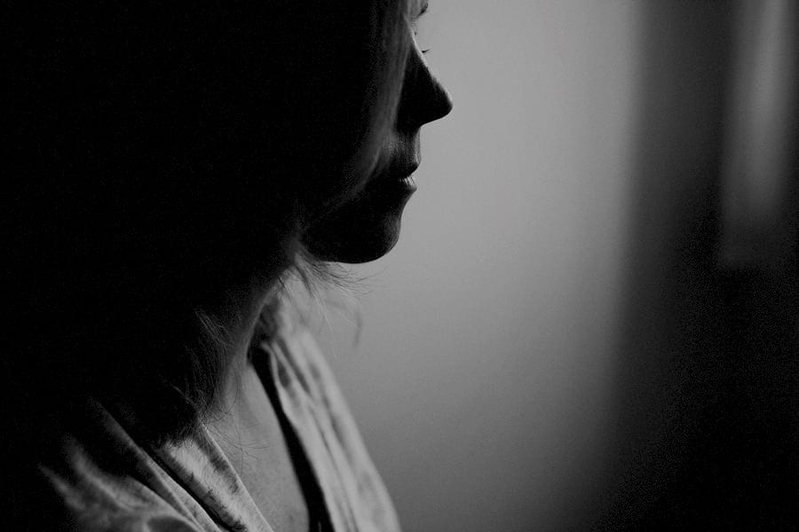 The make up artist applies make up onto the brides face