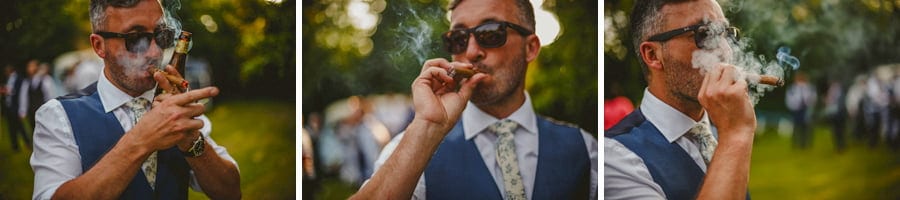 The groom lights up his cigar