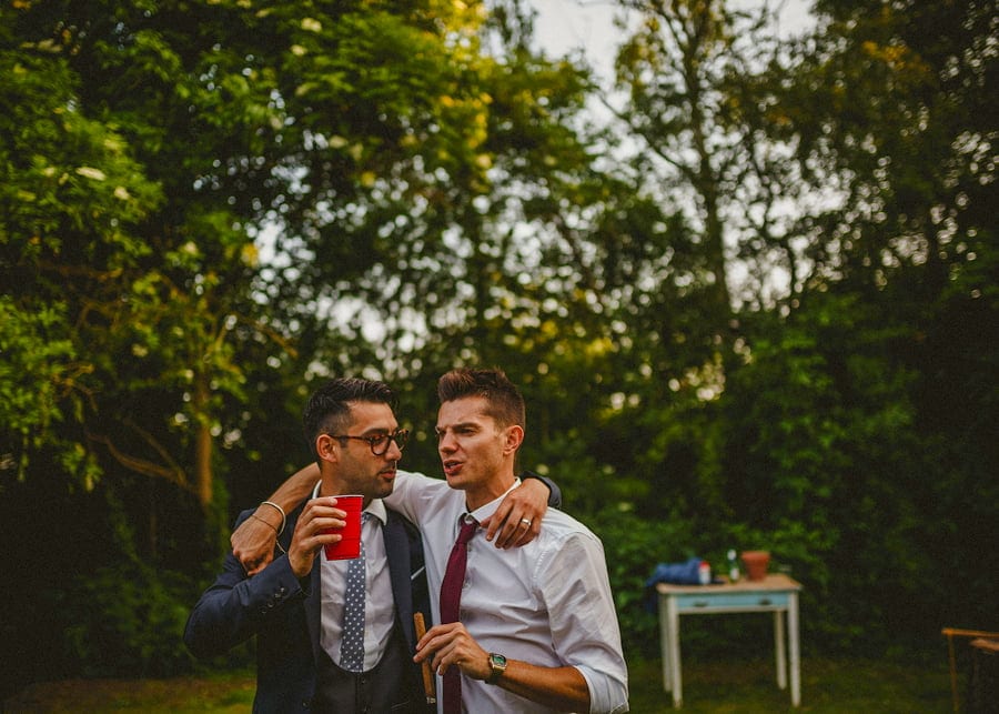 Wedding guests drinking alcohol together