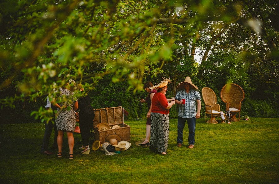The wedding guests dressing up in the back garden