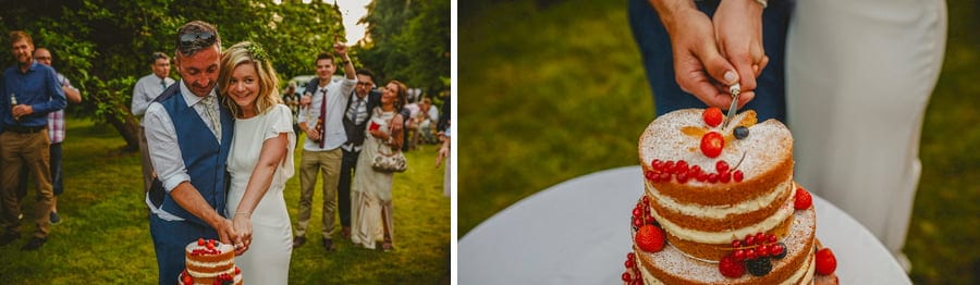 The bride and groom cut the cake