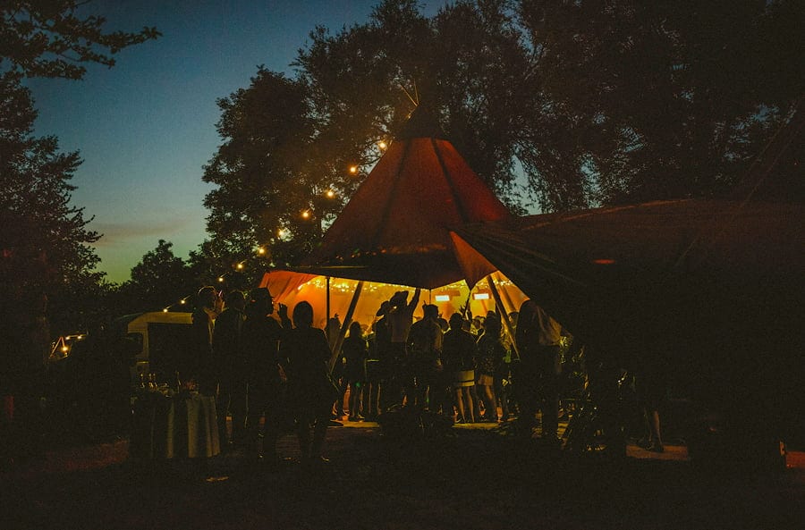 Guests singing and dancing in the marquee