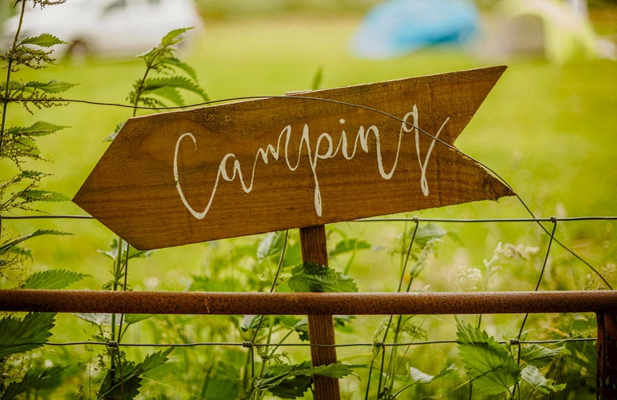 The wooden camping sign at Fernhill Farm