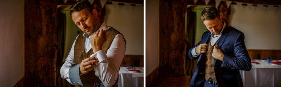 The groom gets ready in the barn at Fernhill farm