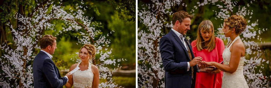 The couple exchange wedding rings during the wedding ceremony