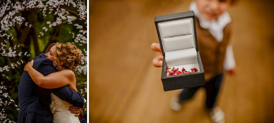 The bride and grooms son holds a box with confetti inside it