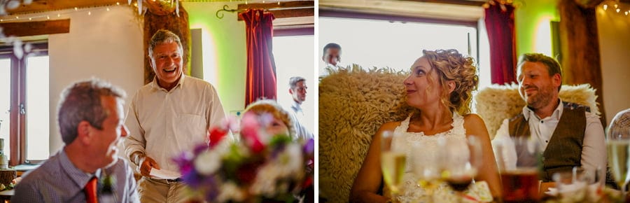 The brides father delivers his speech to the wedding party in the barn at Fernhill Farm