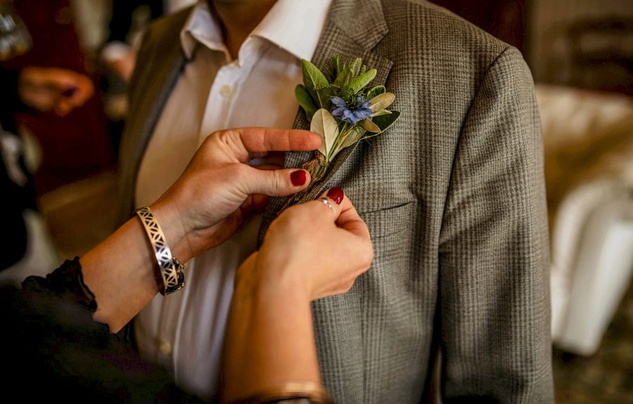 Pinning the flowers to lapels