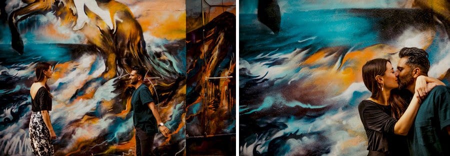 A man and lady hold each other and kiss